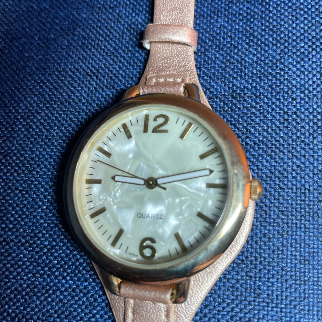 Quartz Large Mother Of Pearl Face 10$